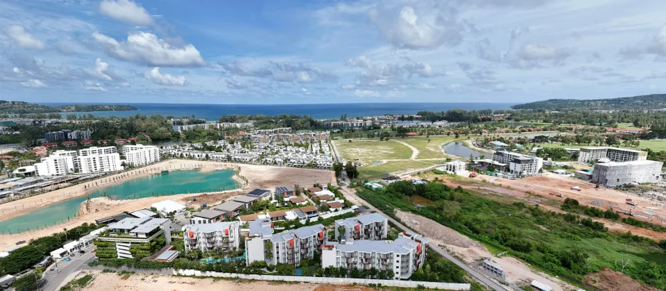 Aerial view of Cherngtalay with resorts, a lagoon and the Andaman Sea beyond